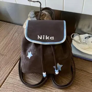 니카 미니 백팩 브라운 별 패턴