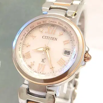 [새상품급] CITIZEN xC 크로스시 핑크 다이얼 전파 솔라 손목시계