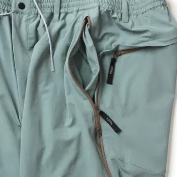 ROTOL TWIST ZIP TECH TRACK PANTS Olive | 브랜드 중고거래 플랫폼