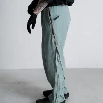 ROTOL TWIST ZIP TECH TRACK PANTS Olive | 브랜드 중고거래 플랫폼