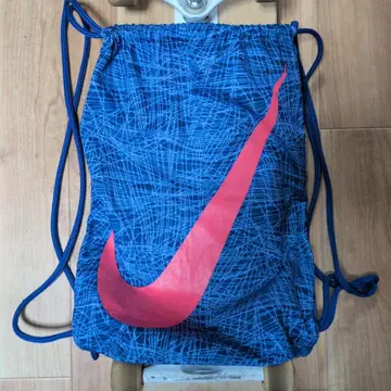 NIKE 냅색 블루 올 패턴 스우시 로고