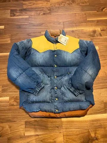 Rocky Mountain Featherbed 다운 자켓 50주년