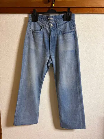AURALEE SELVEDGE FADED LIGHT DENIM PANTS