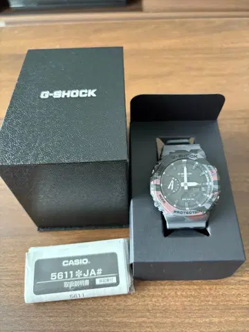CASIO G-SHOCK 카모플라쥬 패턴 손목시계 GA-2100