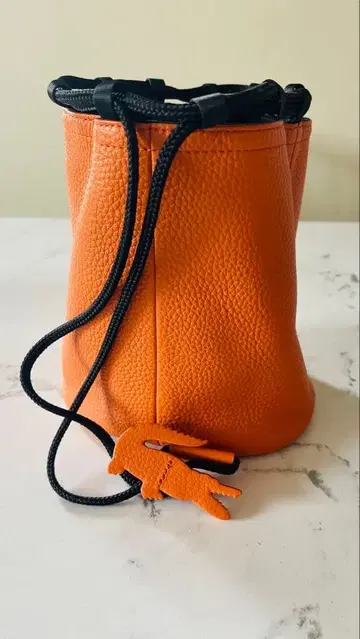 LACOSTE 라코스테 복조리형 백 오렌지