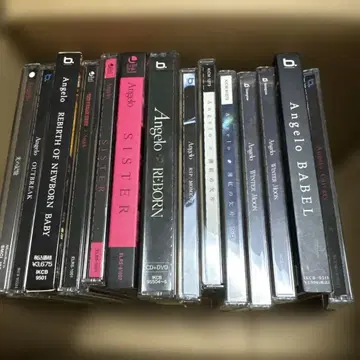 Angelo CD, DVD 묶음 판매 정크 취급