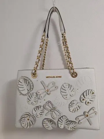 MICHAEL KORS 화이트 핸드백 잠자리 모티브