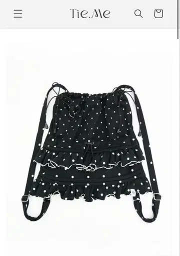 tie.me dot frill knapsack