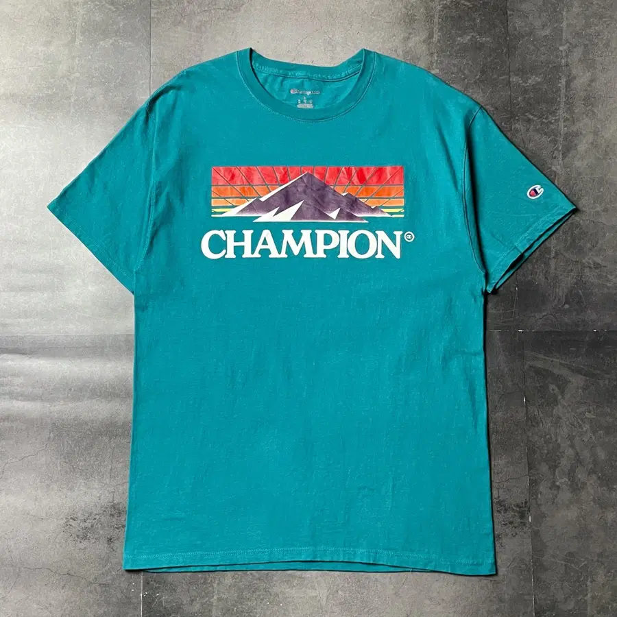 CHAMPION 챔피온 틸그린 그래픽 반팔 티셔츠 A01270