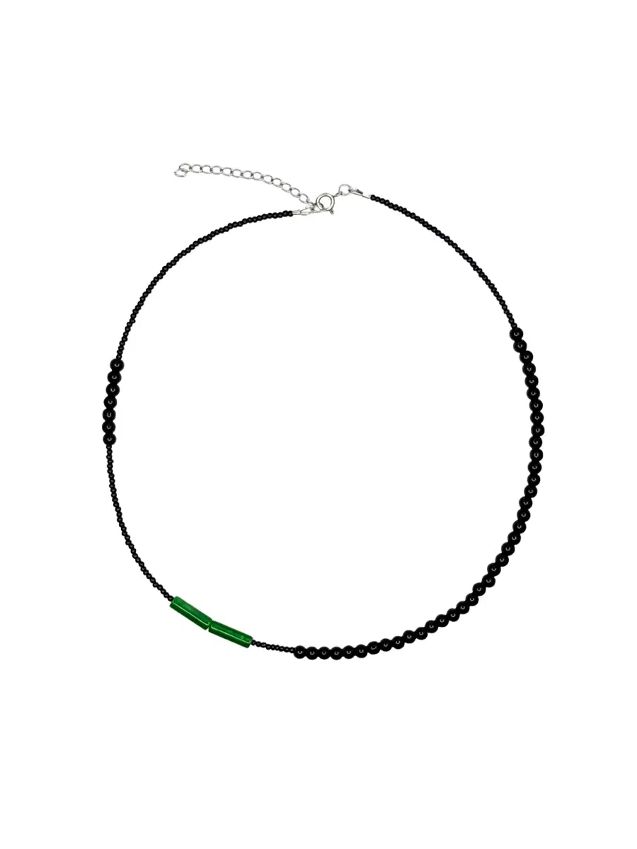 Green with black necklace