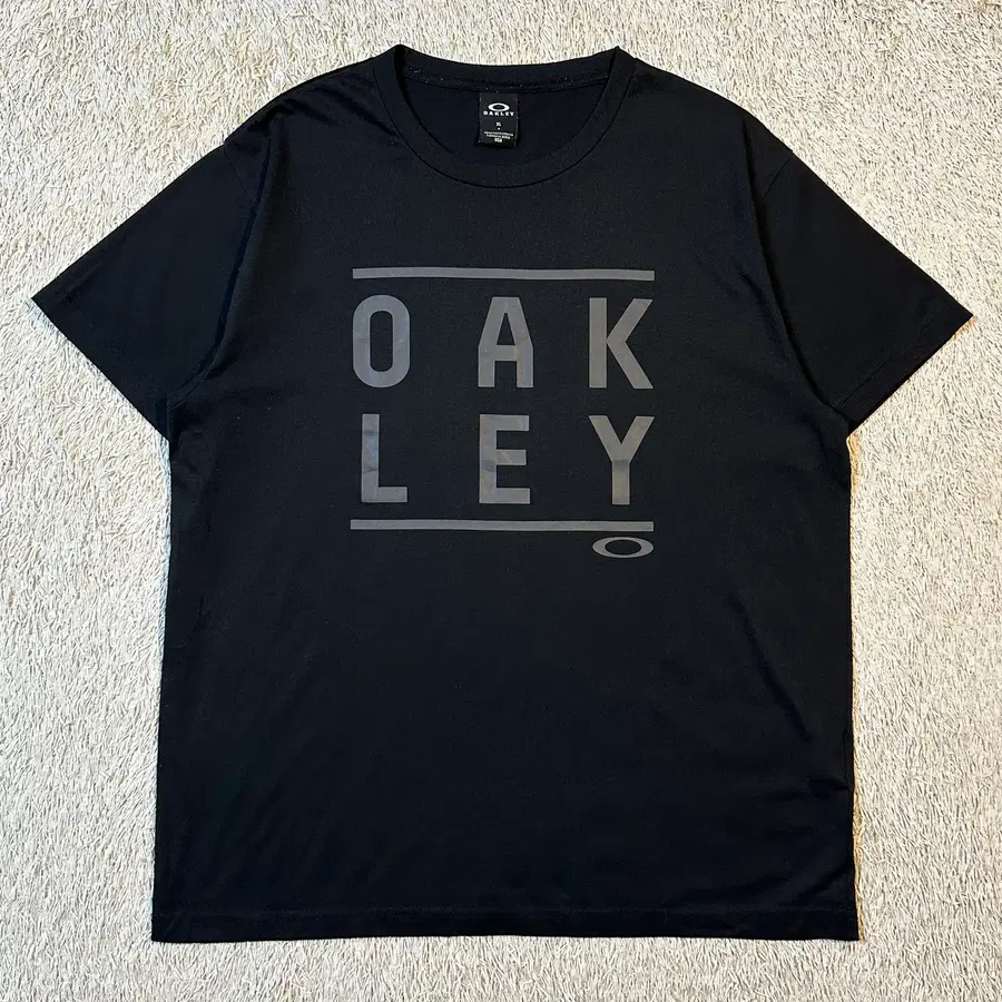 [XL] 오클리 OAKLEY 스펠로고 기능성 반팔 티셔츠 블랙