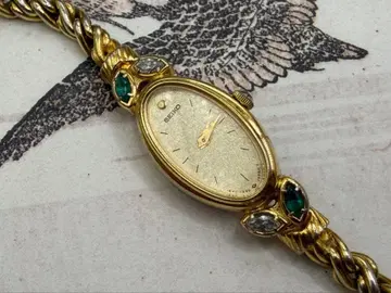 SEIKO 여성용 손목시계 오벌 골드 컬러 1E20-5760