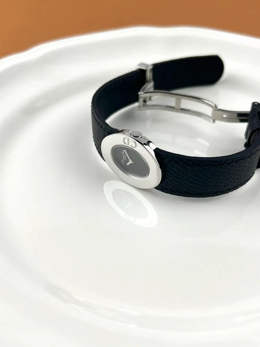 DIOR round symbol watch
