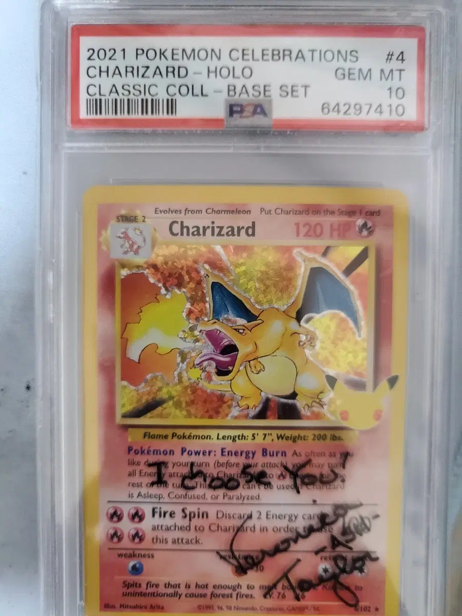2021 pokemon charizard psa10. auto.