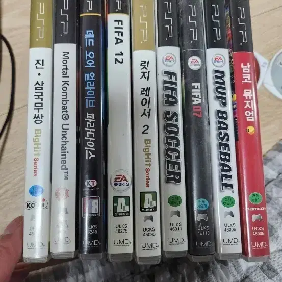 PSP 게임 팩 다수 (진삼국무쌍, 모탈컴뱃, 데드오어얼라이브, FIFA