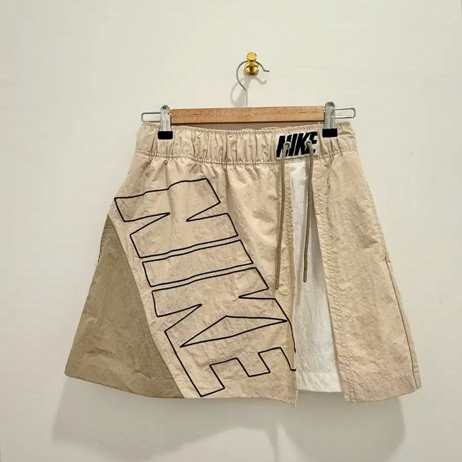 나이키 스우시 트랙수트 스커트 베이지