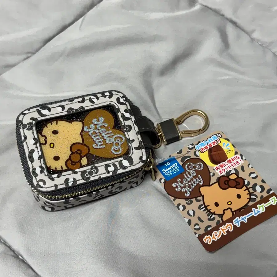 헬로키티 태닝 호피 레오파드 미니파우치 에어팟케이스 키링 블랙