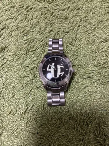 fossil big tic