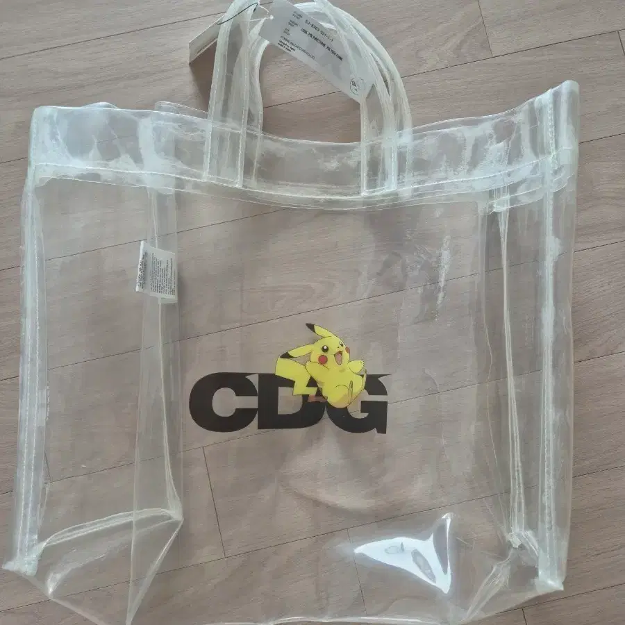 [새상품] 꼼데가르송 CDG x 포켓몬 폴리우레탄 백