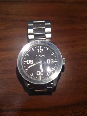 NIXON 남성용 손목시계 아날로그 쿼츠 실버