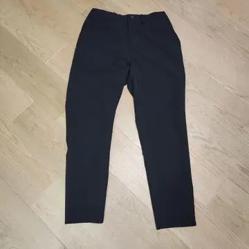 New Balance 남성용 슬림 테이퍼트 팬츠 블랙