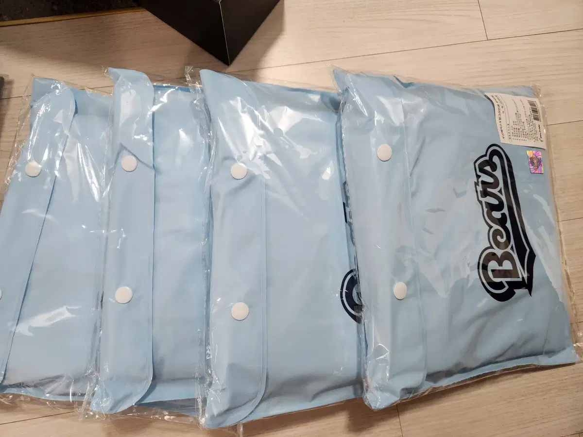 두산베어스 망그러진곰 우비 m, xl 미개봉 새상품
