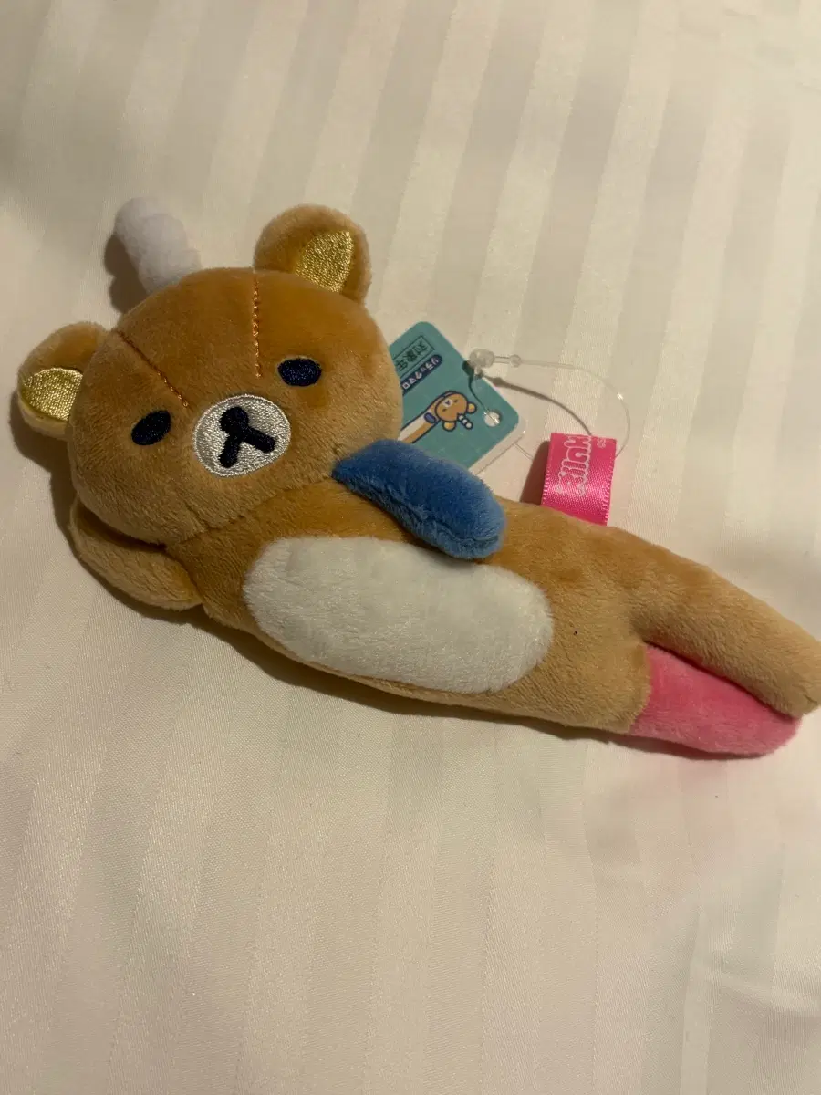 리락쿠마 누워있는 랩 인형 마스코트