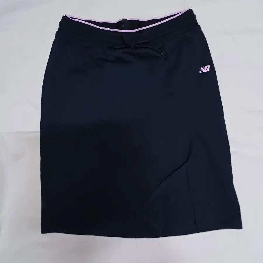 뉴발란스 블랙 핑크 옆트임 미디스커트 80L