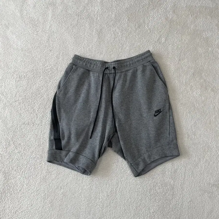 M 나이키 테크팩 반바지