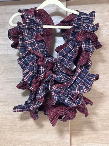HOUGA pixie frill vest