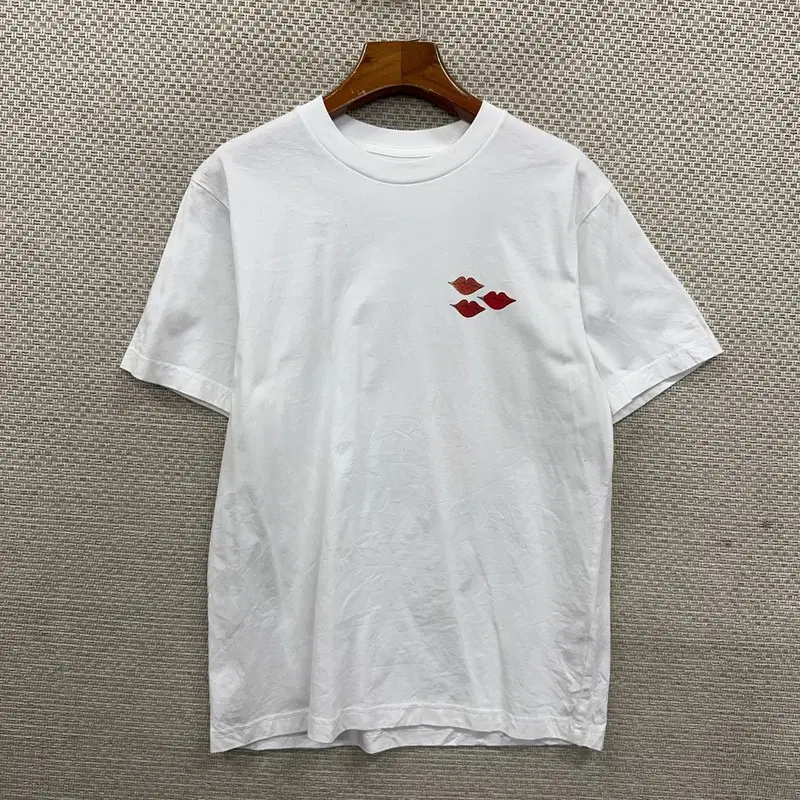 유니클로 카우스 반팔티 M D09072