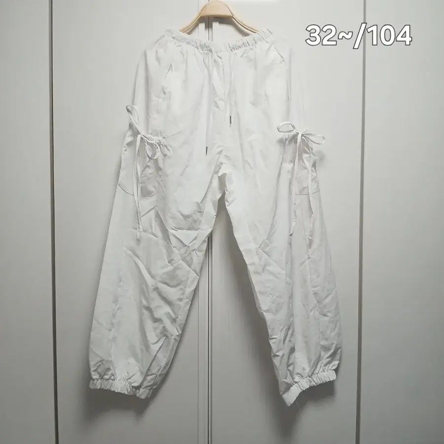 화이트 스트링 우븐 바지