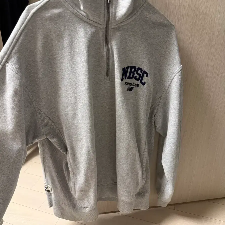 뉴발란스 NBSC 그레이 하프집업 맨투맨 L