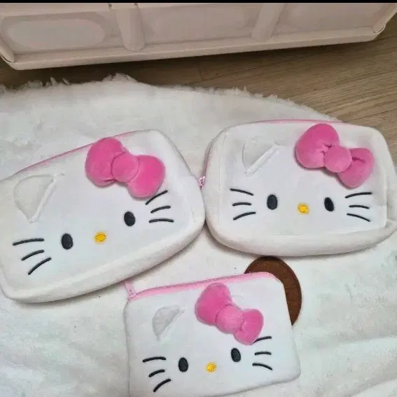 (단종)다이소 헬로키티 핑크 얼굴 파우치 2종