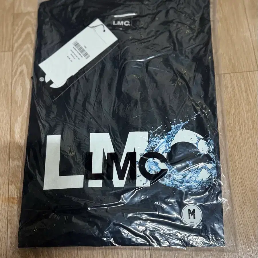 새상품) LMC 로고 물결 반팔티 엘엠씨 M