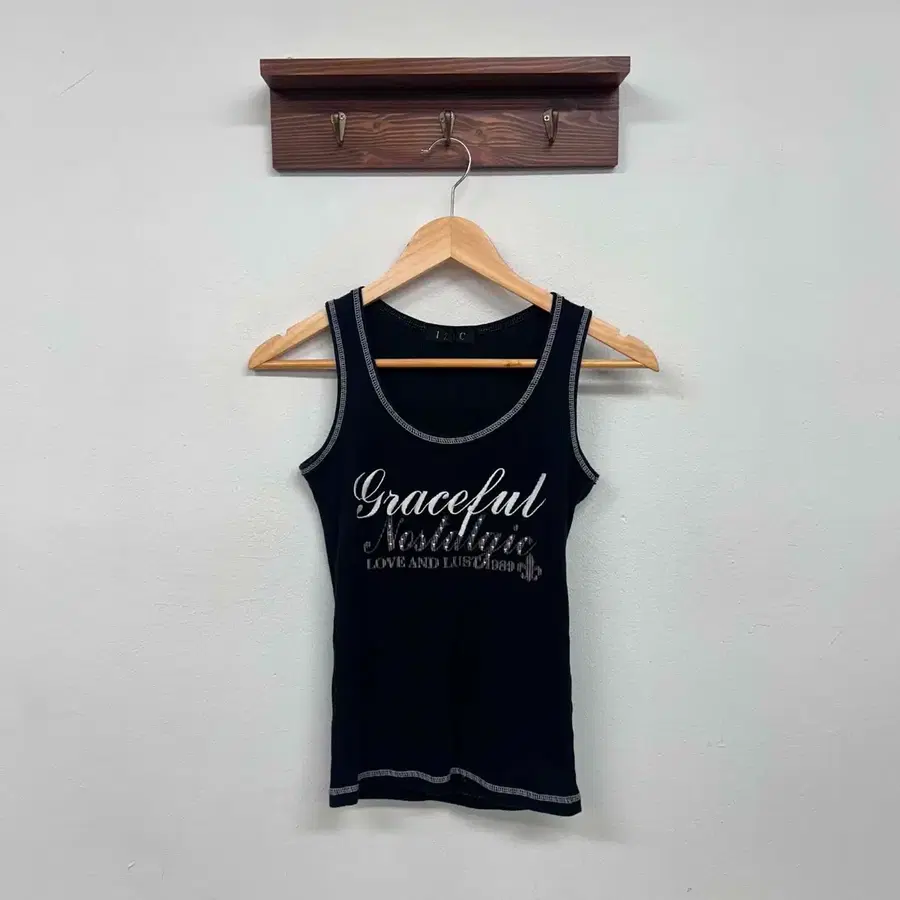 IZIC japanvintage 그래픽 슬리브리스 탑 골지 니트