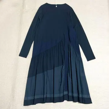 이오콤이오 플레어 롱 원피스 이소재 절개 비대칭 센소유니코