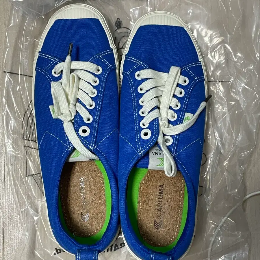 카리우마 OCA 로우 캔버스 블루