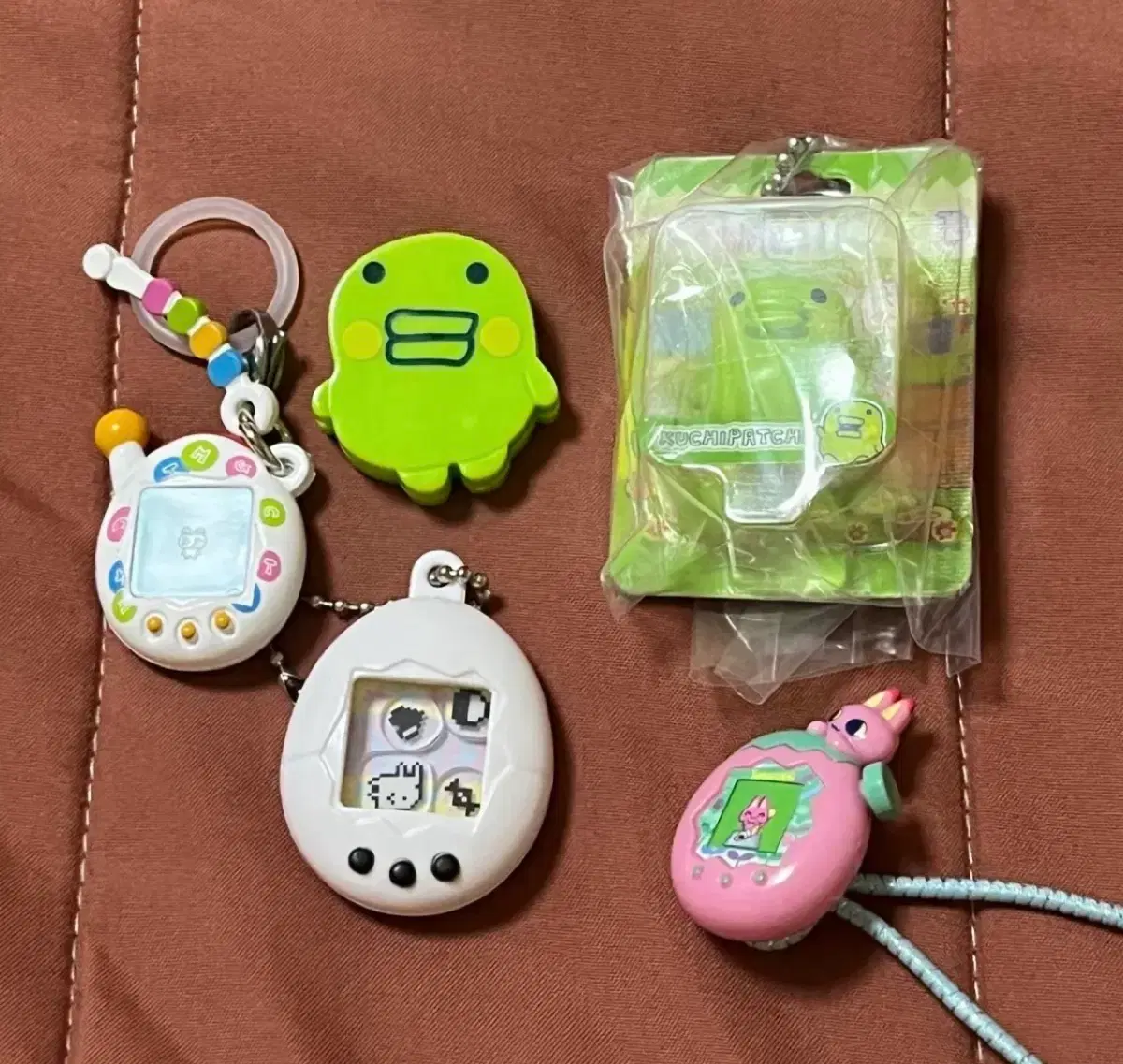 다마고치 메지루시 집게 가챠 굿즈