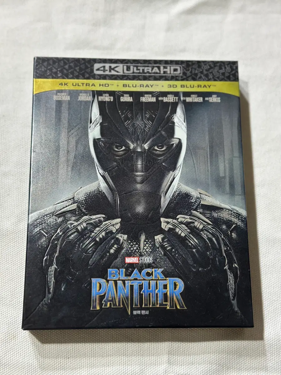 (개봉)[4K 블루레이] 블랙 팬서 : 스틸북 콤보팩 (3disc: 4K UHD + 3D + 2D) - 북릿(36p) + 와칸다 엽서(3종) + 캐릭터 카드(7종) + 굿즈봉투