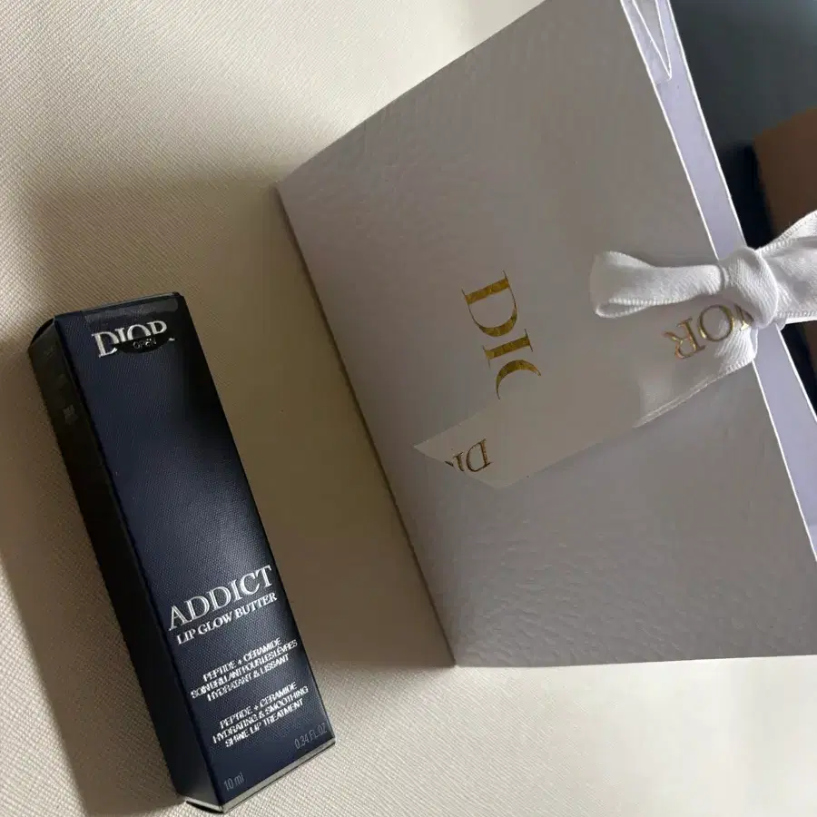 디올 어딕트 립 글로우 버터 105