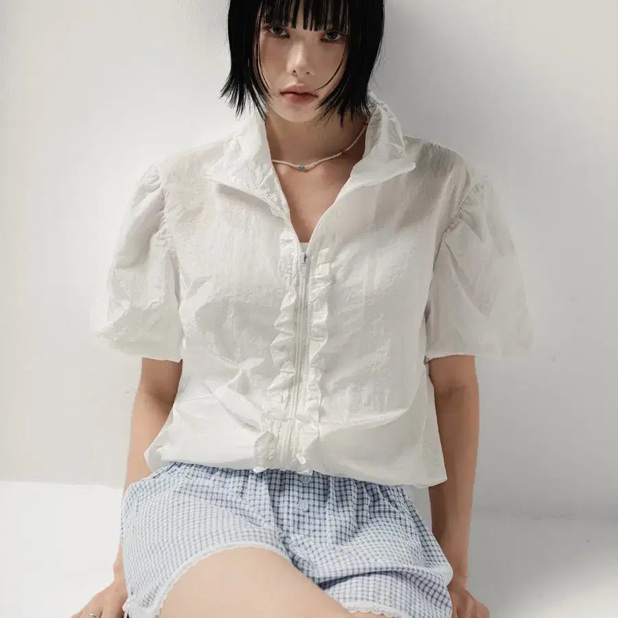 누아뮤트 블랙 퍼프 바람막이