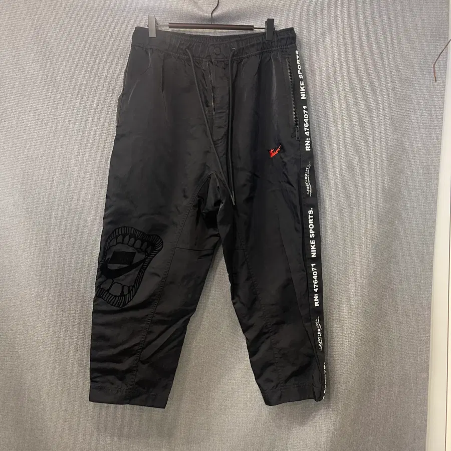 나이키 NIKE 스포츠웨어 그래픽 우븐 팬츠