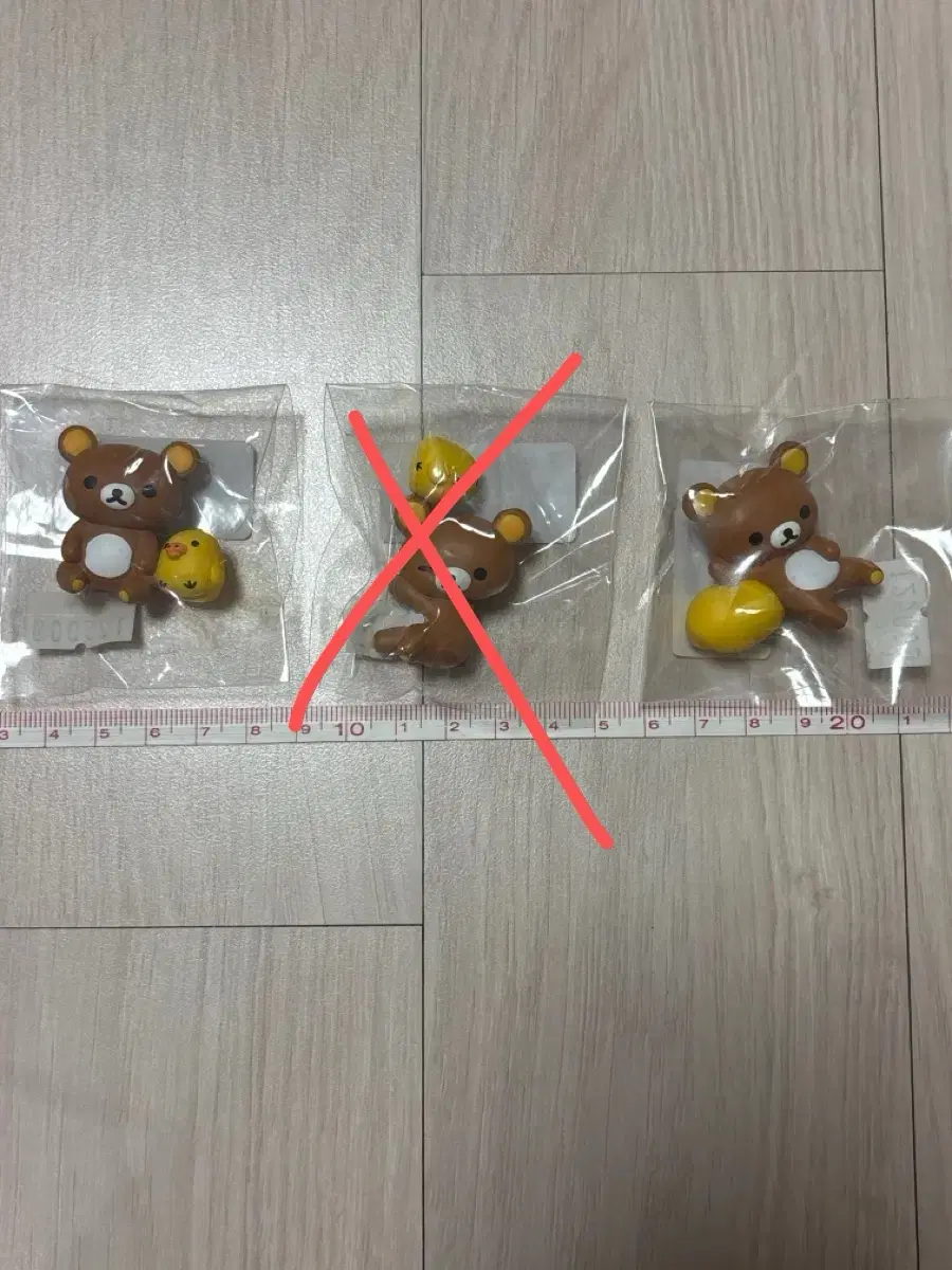 푸티토 컵 위의 리락쿠마 히퍼