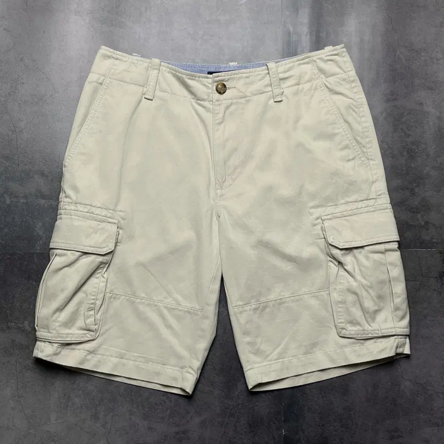 TOMMY HILFIGER 토미힐피거 아이보리 카고 하프팬츠 A01347