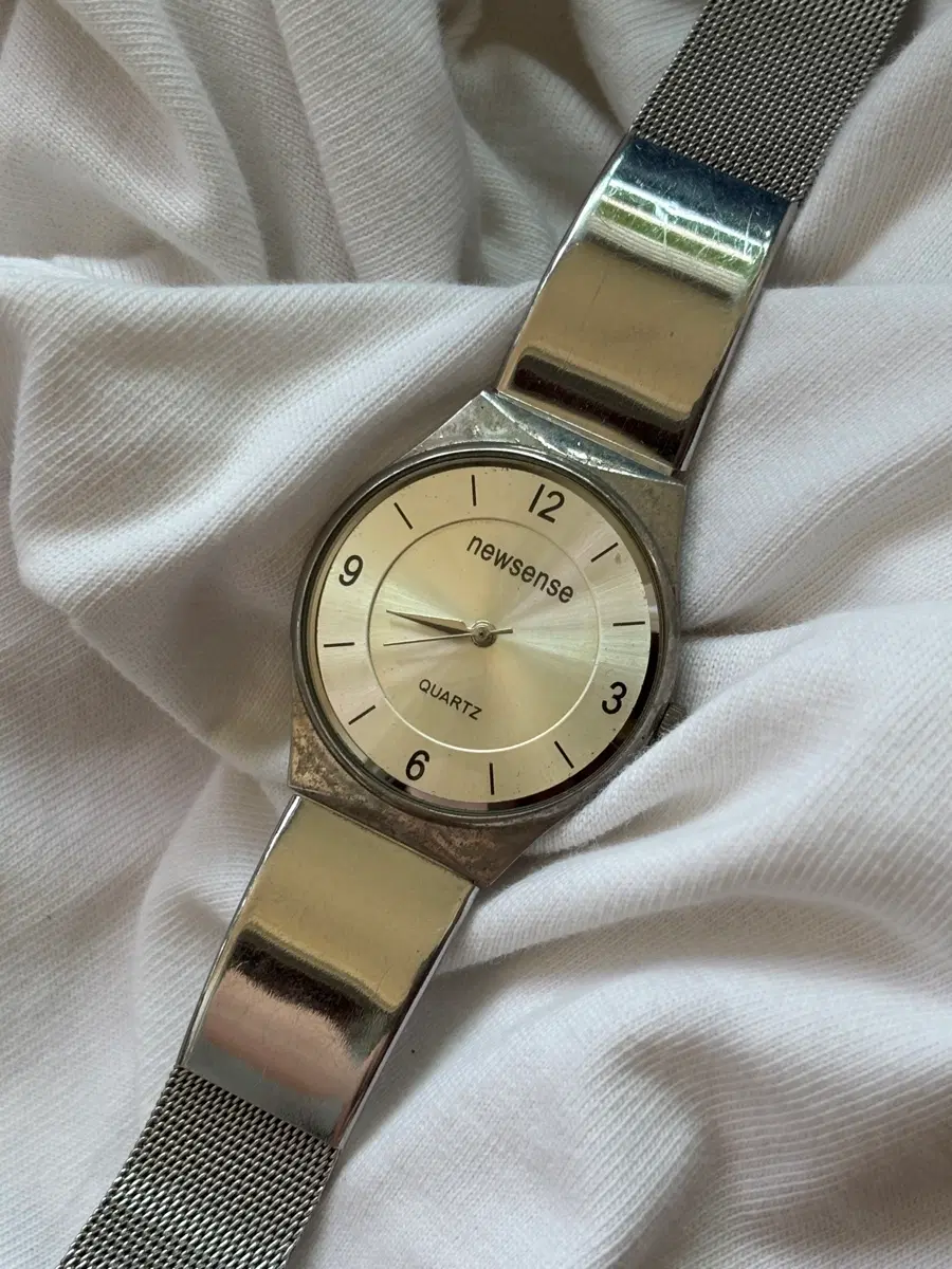 vintage newsense metal clear watch