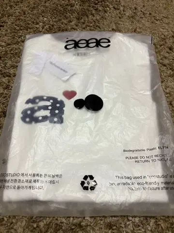 aeae 화이트 코튼 반팔 로고 티셔츠