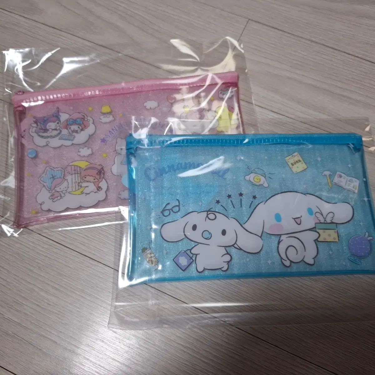 [새상품][개당] 산리오 시나모롤과 캐릭터 투명 양면 PVC 파우치