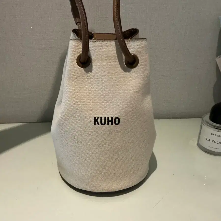 구호 캔버스 버킷백
