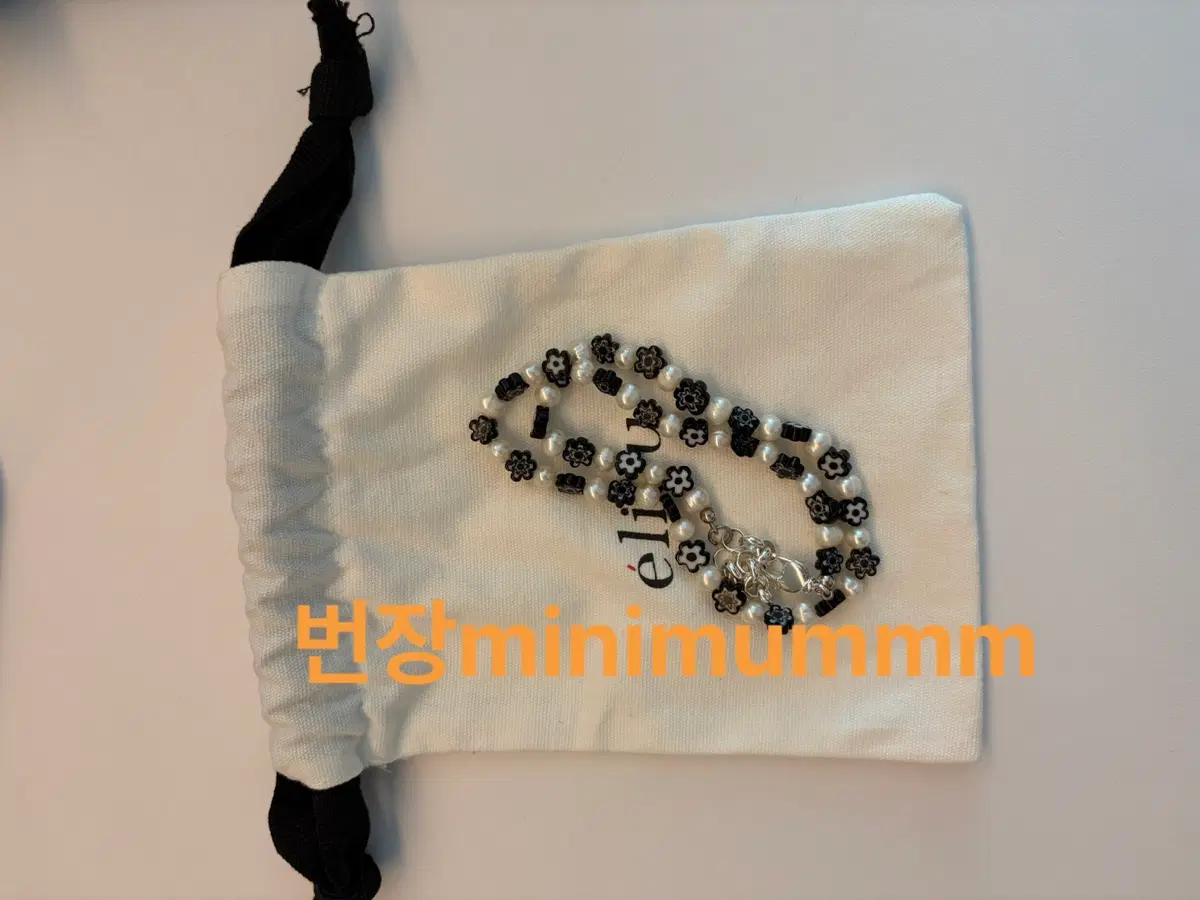 마크 사복템 eliou jengo pearl necklace